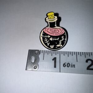 Small Potion Bottle Filled With Bones Pin Brooch
